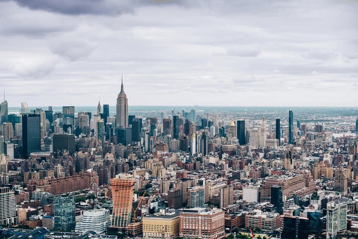 Manhattan skyscrapers look small when seen from a high-flying helicopter.