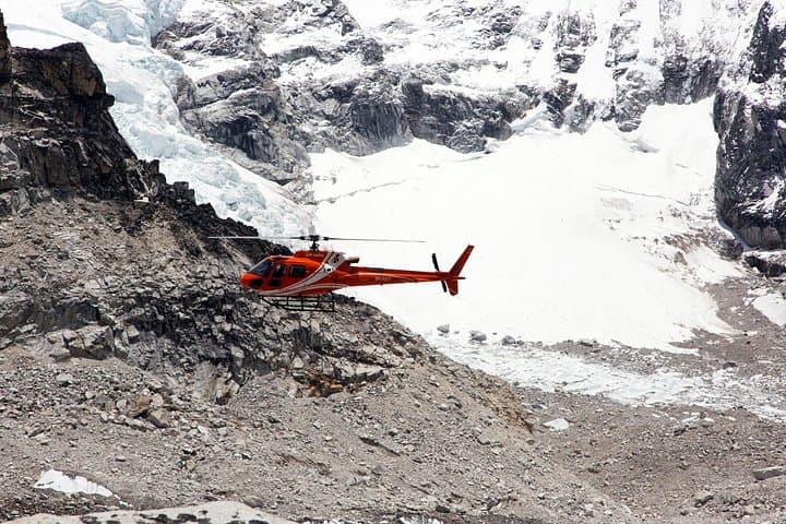 Helicopter during its flight at Everest region