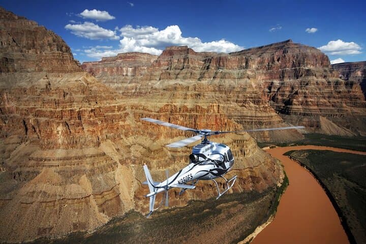 Soar like a Falcon over the might Colorado River by helicopter