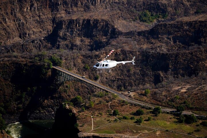 Full Monty-Helicopter Flight, Bridge/Falls Tour & Sunset Cruise